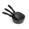 Set of three black non-stick saucepans with handles, nested together.