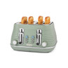 Sage green 4-slice toaster with chrome controls, shown toasting seeded bread.