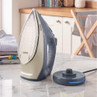 Cordless steam iron and base, blue and silver, kitchen setting
