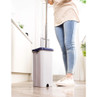 Flat mop and rectangular blue-lidded bucket shown in use on kitchen floor