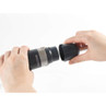 Black and silver Salter electric grinder shown being opened, highlighting detachable cap
