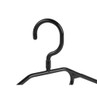 Black plastic clothes hanger, close-up of hook