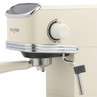 Cream Salter espresso machine close up showing control dial and portafilter.