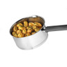 Stainless steel saucepan filled with cooked new potatoes topped with chopped herbs