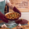 Red casserole dish with meatballs and self-basting lid, highlighting tender, juicy results