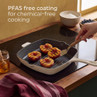 Cream square grill pan with peaches on hob, PFAS free for chemical-free cooking