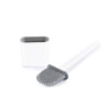 Grey silicone toilet brush with matching holder, angled cleaning head.