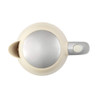 Cream electric kettle viewed from above with silver lid and handle
