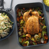Roast chicken on vegetables in roasting tin, with creamy pasta and rice sides