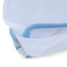 White mesh baby pillow with light blue zip, close-up view