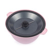 Pink mixing bowl with grey lid and built-in whisk, shown from above.