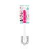 Pink antibacterial dish brush with ergonomic handle, shown in retail packaging.
