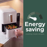 White air fryer with wood-effect handle and energy saving message
