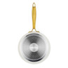 Cream frying pan with gold handle, viewed from base, Salter branding visible.