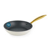 Cream frying pan with gold handle, angled view, metal utensil safe