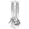 Set of stainless steel kitchen utensils on a stand