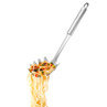 Stainless steel spaghetti server lifting pasta with vegetables