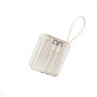 Cream portable power bank with built-in charging cables and carry strap