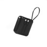 Black portable power bank with attached charging cables, shown on white background