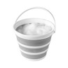 Grey and white collapsible bucket with soapy water