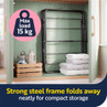 Foldable black clothes airer stored in cupboard with 15kg max load graphic