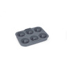 Grey silicone donut mould with six cavities, shown angled on white background
