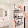 Black over-door shower caddy with three wire baskets