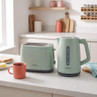 Mint green kettle and toaster set on kitchen counter