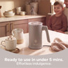 Salter milk frother on kitchen counter with hot drink