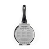 Grey marble ceramic 16 cm saucepan with black handle, shown in retail packaging