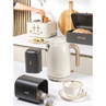 Cream Salter kettle and toaster set on kitchen counter with bread bin and tea caddy