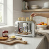 Chrome 4-slot toaster with slices of bread, shown on kitchen counter
