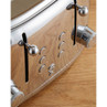 Chrome toaster close-up showing controls and levers, on wooden surface