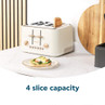Cream 4-slice toaster with rose gold details and one slice of toast