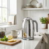 Chrome electric kettle with handle on kitchen counter