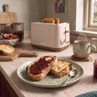 Mocha 2-slice toaster on kitchen counter with toast and coffee