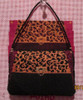 XO-264 The Point Of It All Designs Leopard Purse Ornament 3.5 x 2.5 ish 18 Mesh Shown Finished 