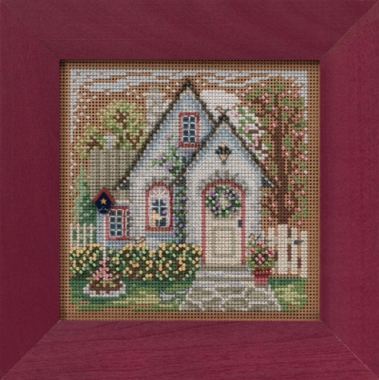 Trellis + cross stitch = awesome stitching frame - Peacock & Fig