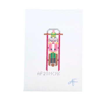 Sled with Pink Nutcracker 4.25"H x 2"W 14 Mesh AF28NCPK  Anne Fisher Needlepoint, llc