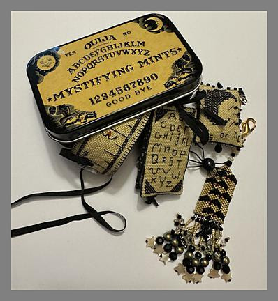 Fern Ridge Collections Bats in a Row and a Crow Ouija Tin with Smalls