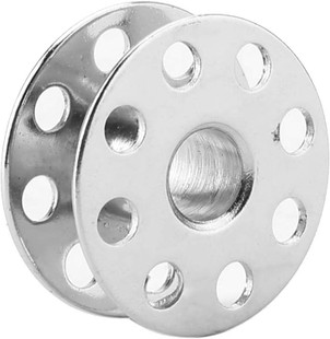 Close-up of the 229-32909 (270010, B9117012000) Steel Bobbin with Holes for Juki DDL-8100e Industrial Sewing Machine, made in Japan by Seki. Close-up of the 229-32909 (270010, B9117012000) Steel Bobbin with Holes for Juki DDL-8100e Industrial Sewing Machine, made in Japan by Seki.