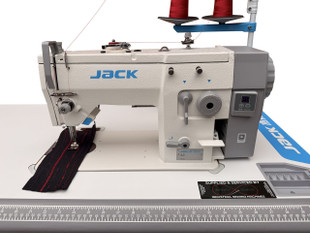 A close-up image of the Jack JK-20U-93Z Short Arm Zig-Zag Machine. The machine is set up for sewing and features adjustable zig-zag stitching, a precise stitch button, and a direct drive motor. The image showcases its robust construction, including the control panel and the convenient zig-zag width adjustment lever. This image is an illustration of the machine's quality and versatility for sewing and embroidery projects.
