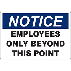 Notice sign indicating 'Employees Only Beyond This Point' for clear workplace safety and access control.