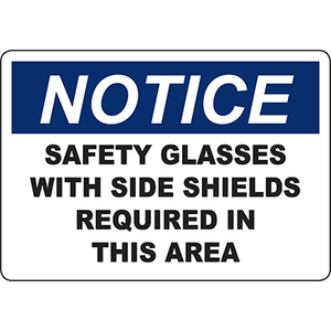 Notice sign requiring safety glasses with side shields in this area for workplace safety compliance.