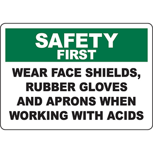 Safety first sign instructing to wear face shields, gloves, and aprons when handling acids for industrial safety.