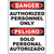 Bilingual safety sign stating 'Danger Authorized Personnel Only' and 'Peligro Solo Personal Autorizado' for workplace safety.