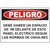 Warning sign stating 'PELIGRO: Debe haber un espacio de 1m delante de este panel electrico segun las normas de OSHA-NEC.'
