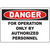 Danger sign indicating operation restricted to authorized personnel, essential for safety in industrial environments.