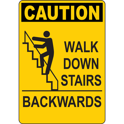 Caution sign indicating to walk down stairs backwards, highlighting safety protocols in industrial settings.