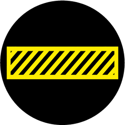 Black and yellow crosswalk floor sign indicating safety zone for pedestrians and equipment in industrial settings.